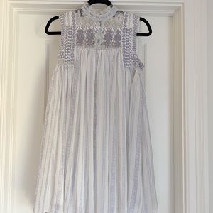 White Dress with Purple Detailing